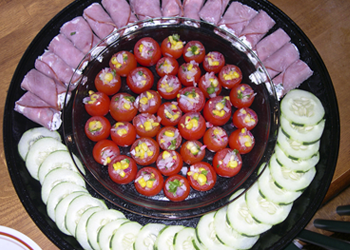 stuffed tomatoes, ham rollups and cucumbers